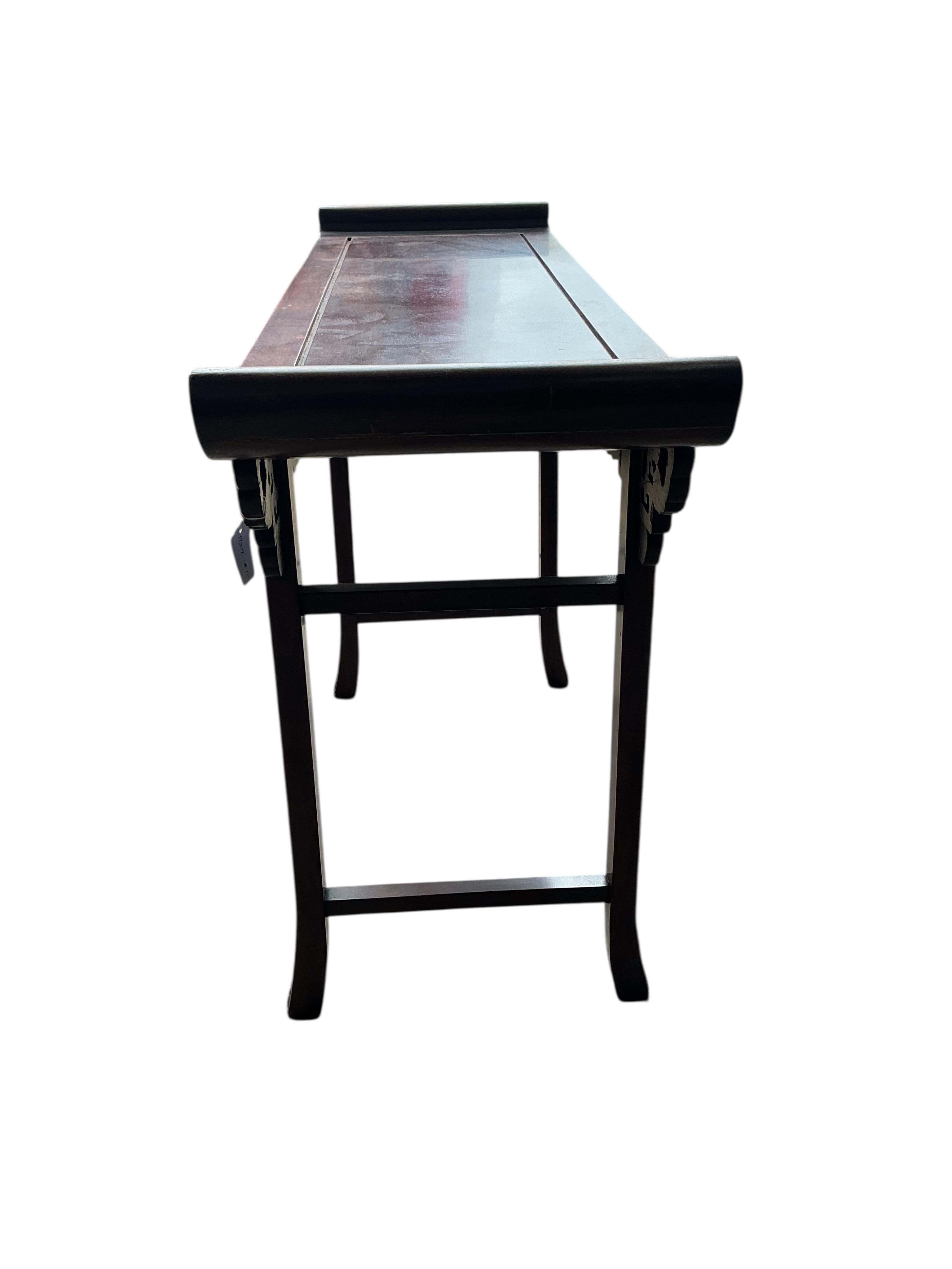A Chinese altar table, width 122cm, depth 40cm, height 84cm